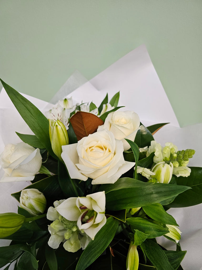 A bunch of classic whites and green flowers sent by  florist Wellington