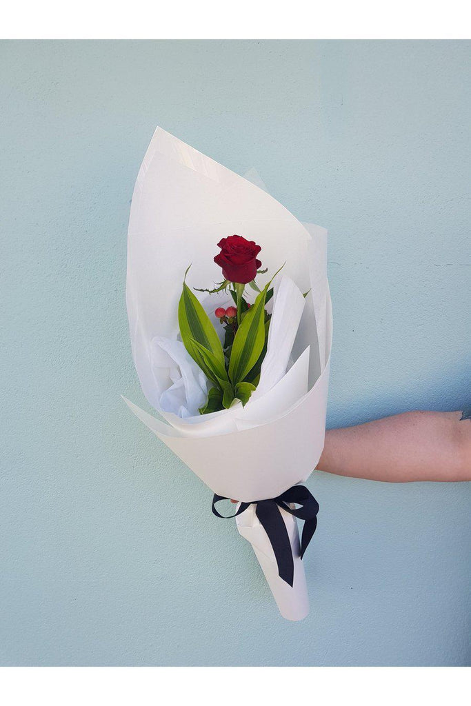 The Perfect gift for the person you love, a single Rose with beautiful foliage and wrap. Sent with a gift card containing your own personal message, and wet wrapped on the stems’ ends to ensure freshness